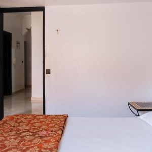 Kamer met een Queen Size Bed